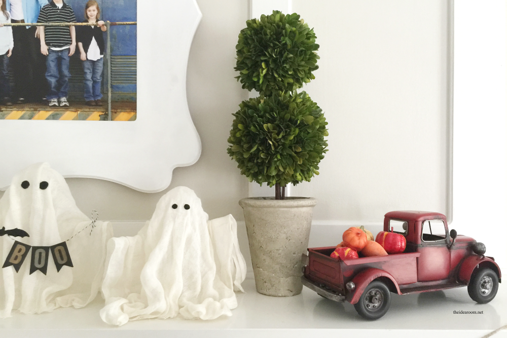 DIY-Halloween-Ghosts Create some fun DIY Halloween Ghosts for your Halloween Decor or Halloween Party this year.  Easy Halloween craft tutorial made out of cheese cloth.
