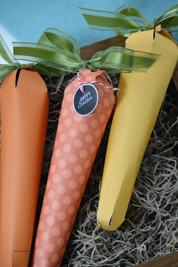 Crafts | Create these Easter Paper Carrots.  Fun for an Easter Gift with your favorite Easter Treats inside or some Easter Decor.