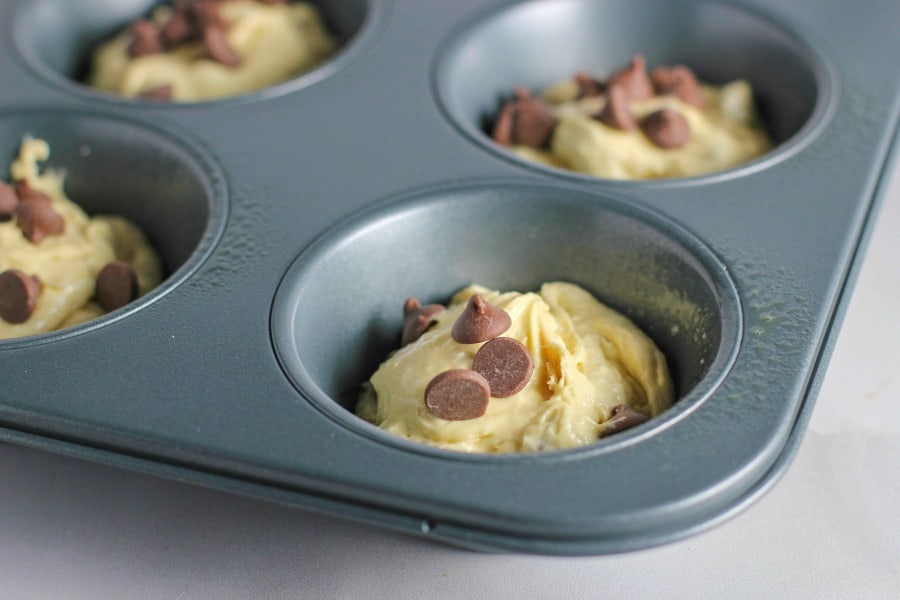 Muffin Tins filled with Banana Chocolate Chip Batter.